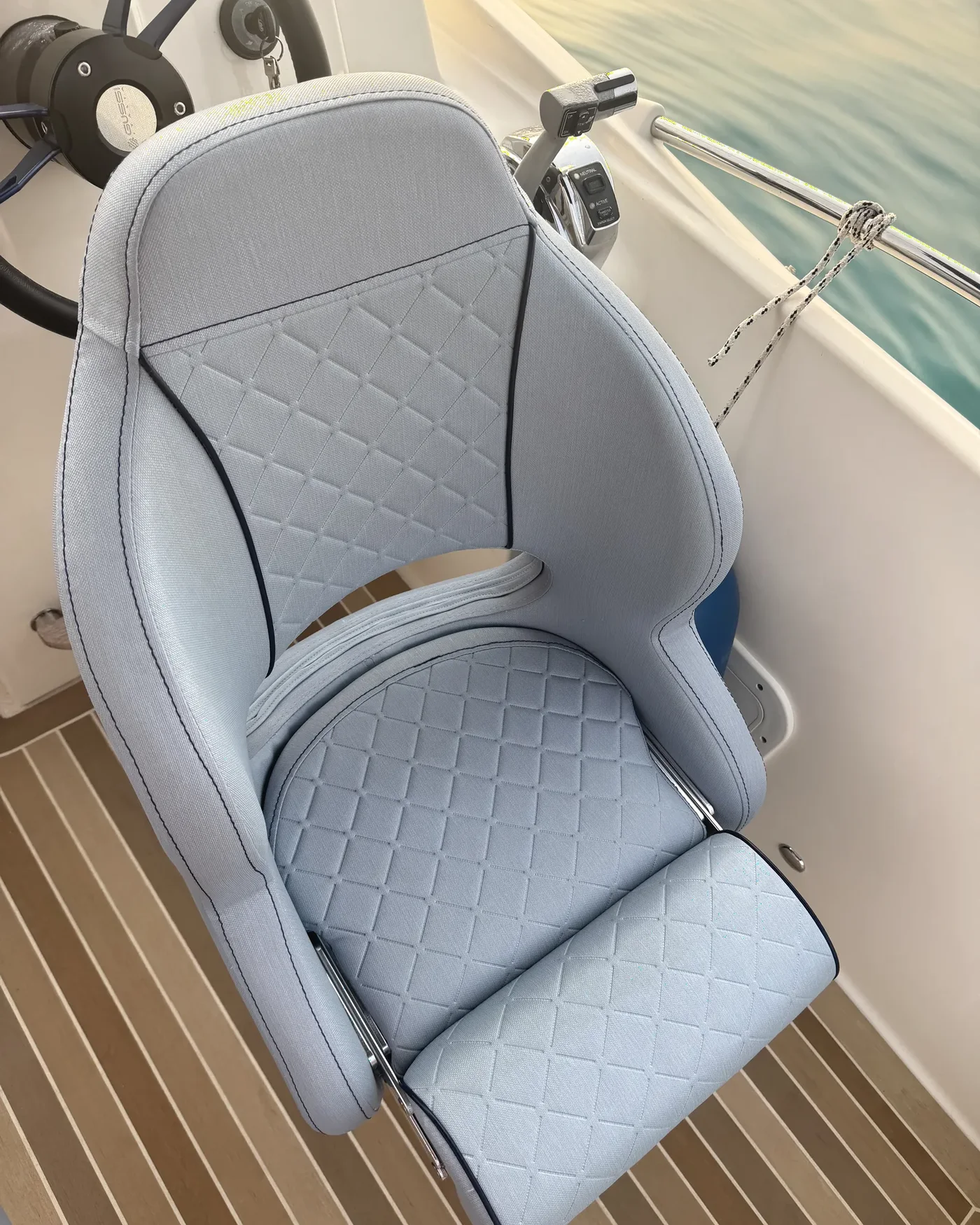 Custom upholstered marine helm seat